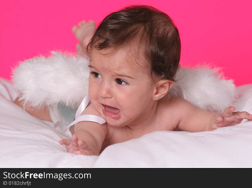 Cute baby girl withangel wings on pink background. Cute baby girl withangel wings on pink background