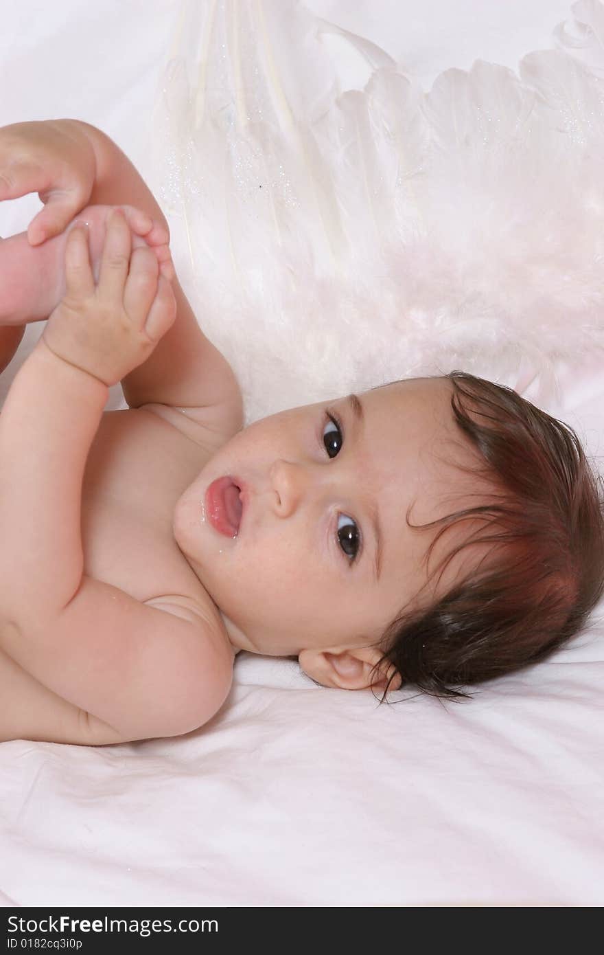 Cute baby girl with angel wings. Cute baby girl with angel wings