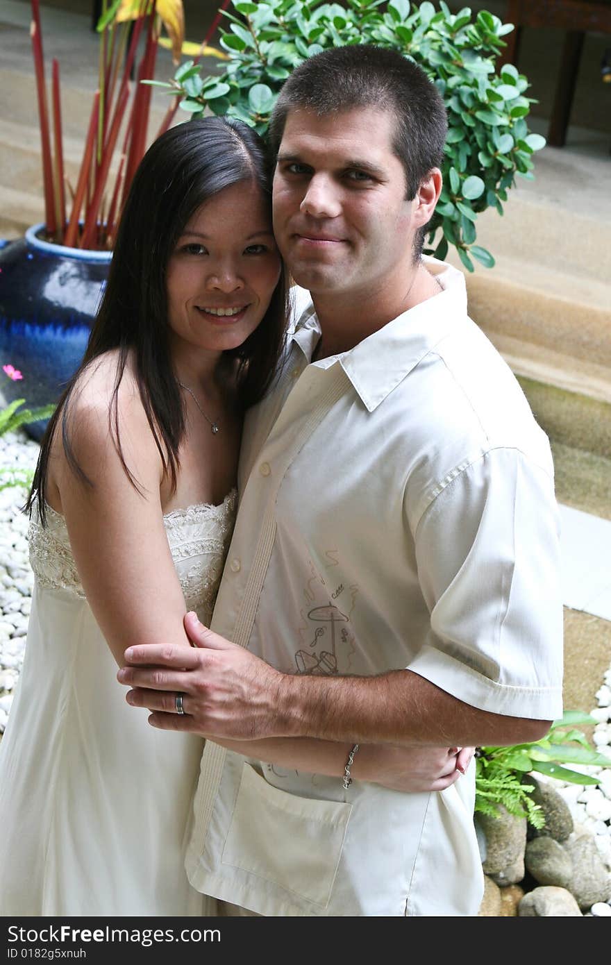 Happy bride and groom on their wedding day. Happy bride and groom on their wedding day.