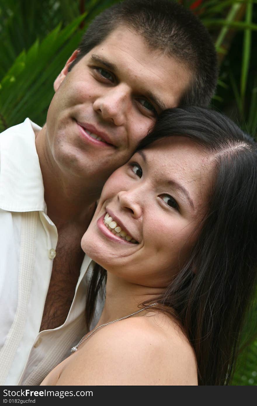 Happy bride and groom on their wedding day. Happy bride and groom on their wedding day.