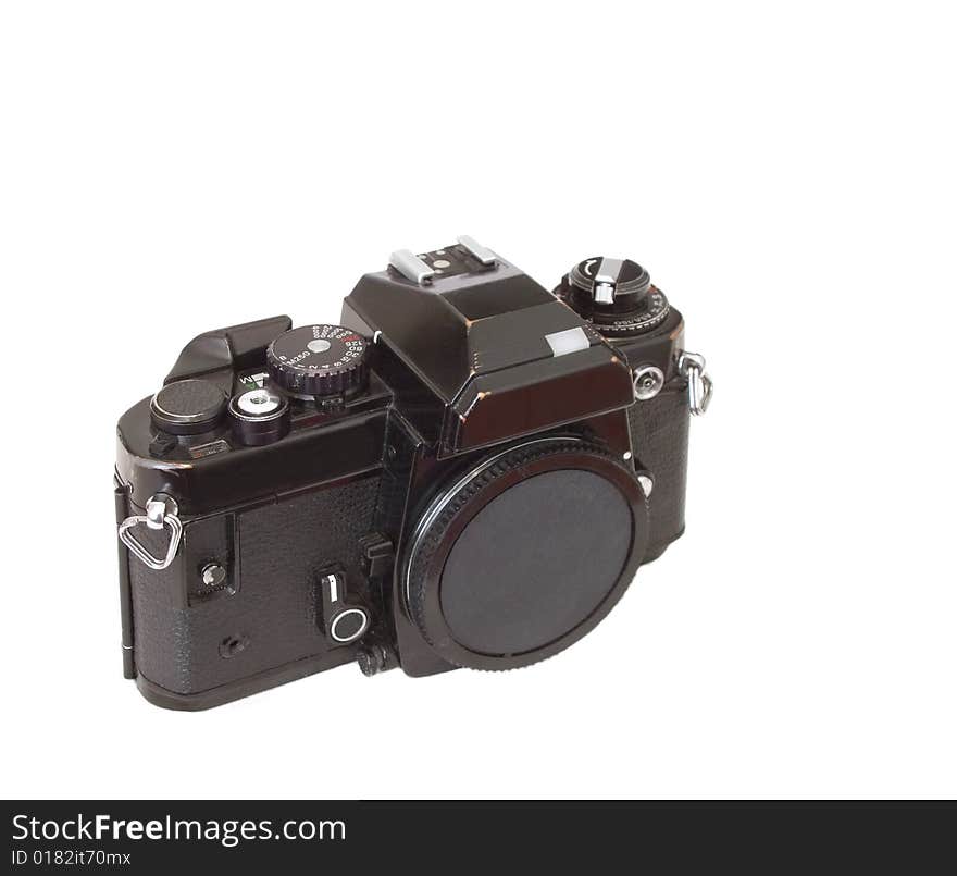 Vintage 1970's 35mm SLR camera body isolated on white. Vintage 1970's 35mm SLR camera body isolated on white