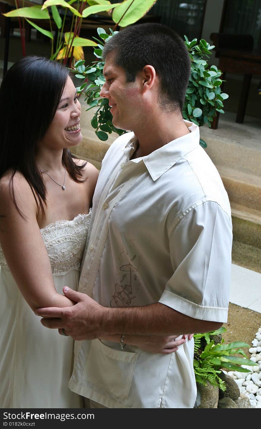 Happy bride and groom on their wedding day. Happy bride and groom on their wedding day.