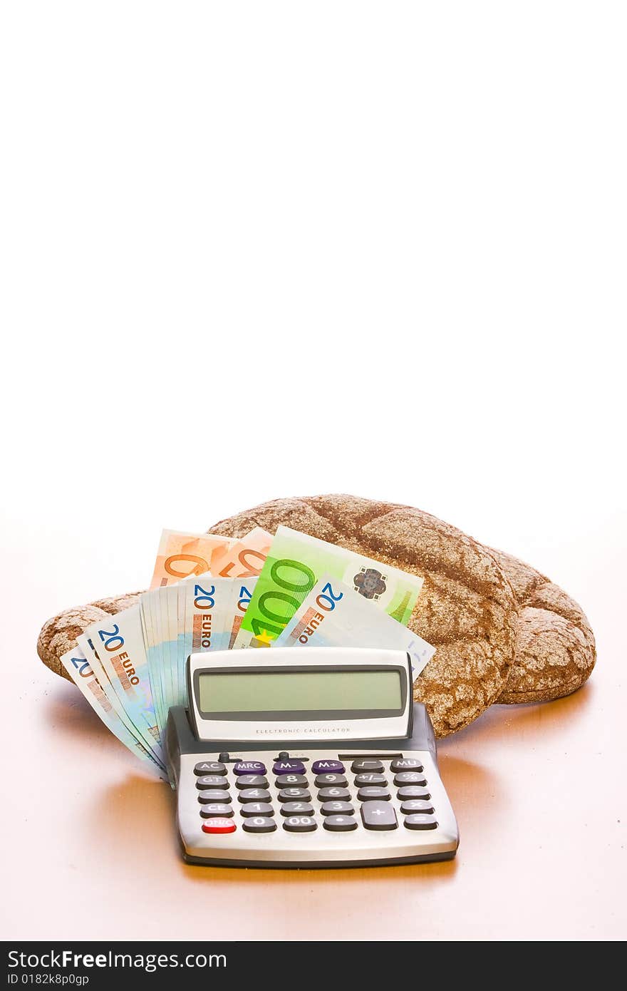 Fresh round rye bread with euros. Fresh round rye bread with euros