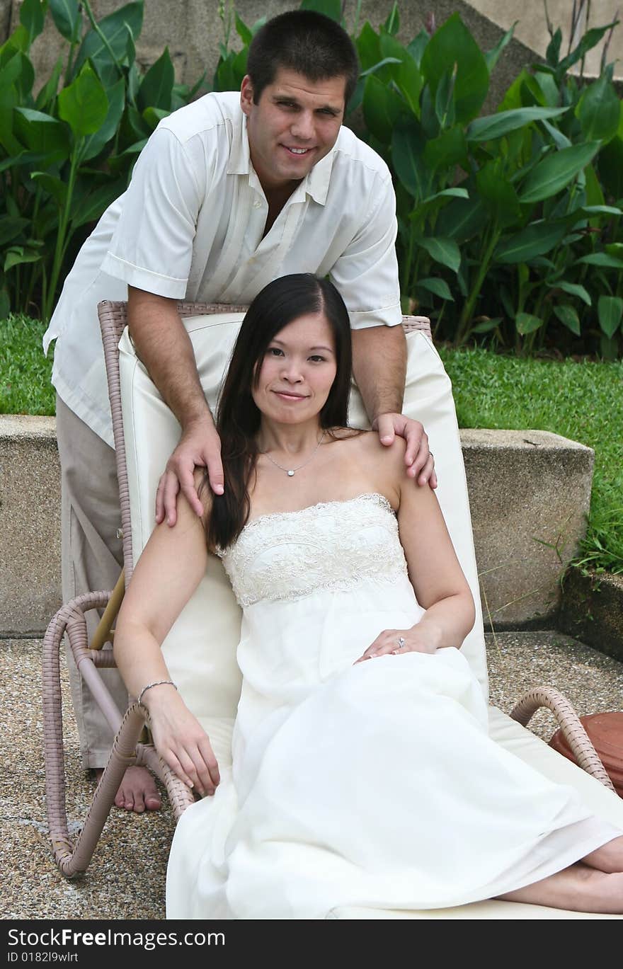 Happy bride and groom on their wedding day. Happy bride and groom on their wedding day.