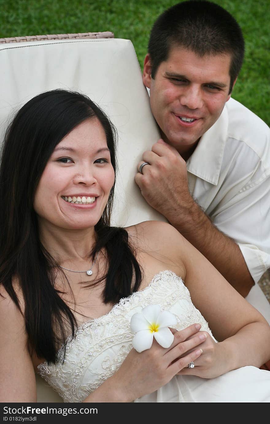 Happy bride and groom on their wedding day. Happy bride and groom on their wedding day.