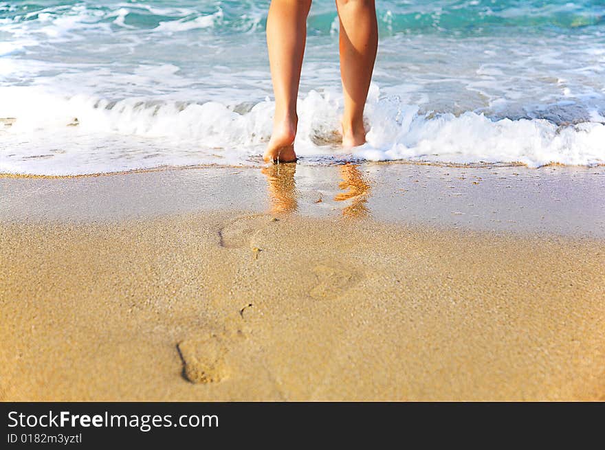 Woman s legs, going to sea