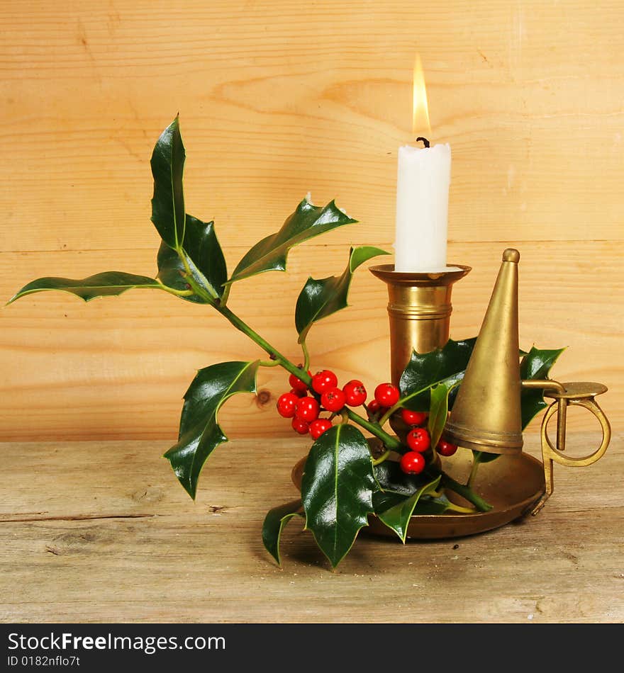 Candle and holly