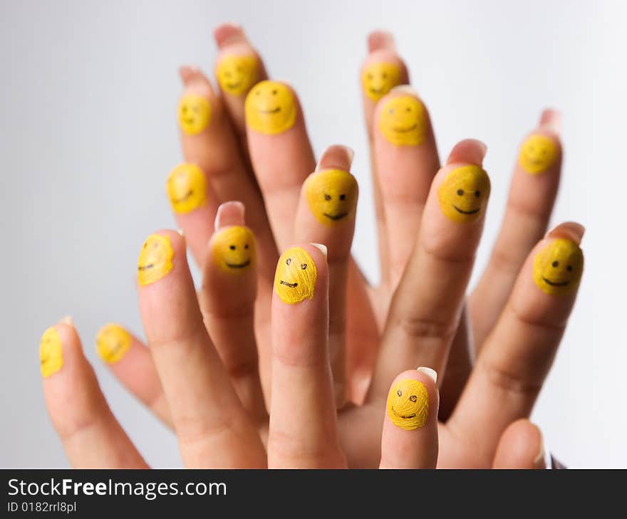 Group of smiling happy fingers over grey background. Group of smiling happy fingers over grey background