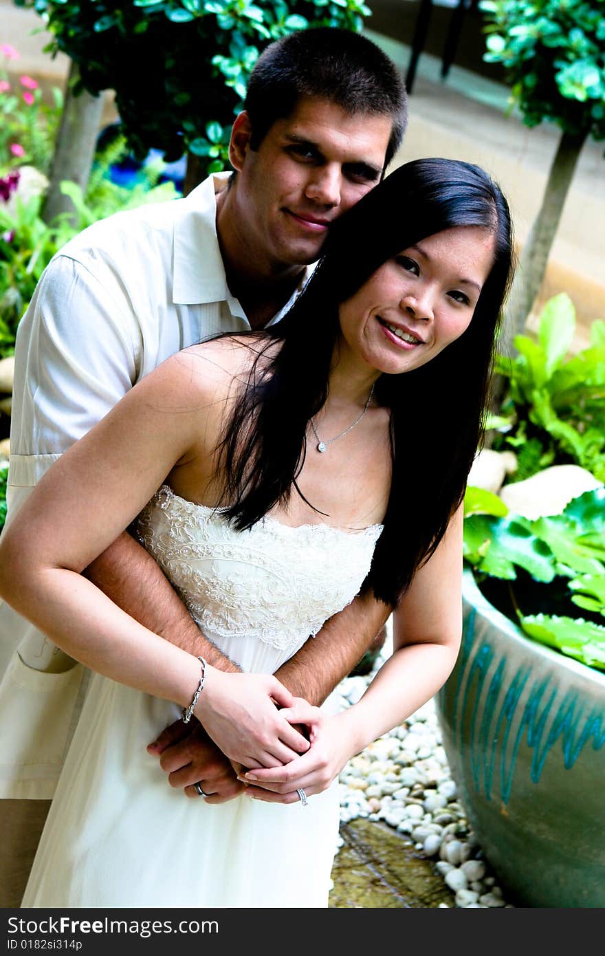 Happy bride and groom on their wedding day. Happy bride and groom on their wedding day.