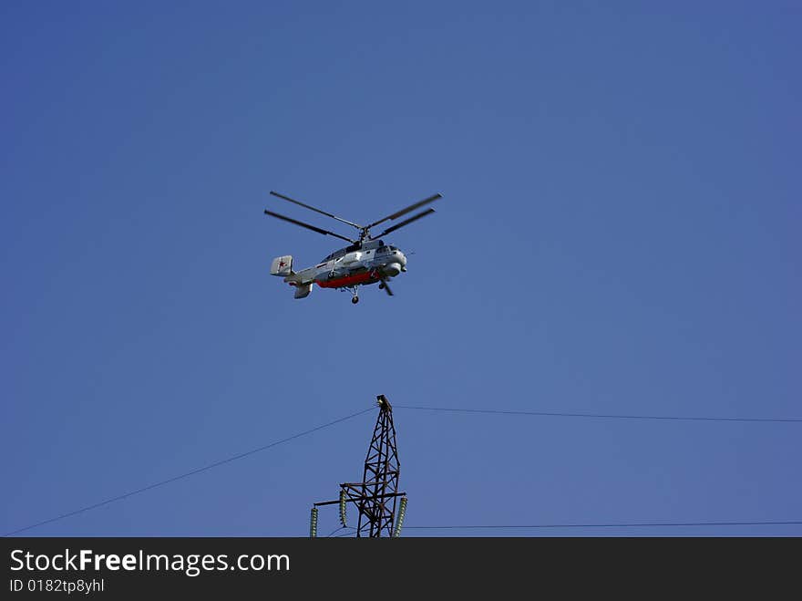 Helicopter which will fly over the thrust electricity transmission