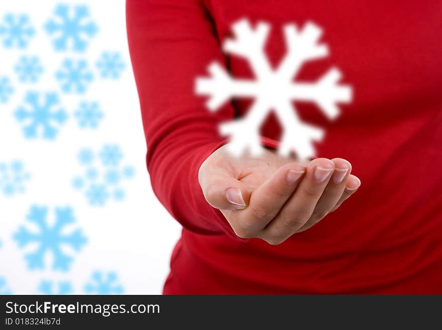 Santa woman in red shirt celebrating christmas holding giant snowflake. landscape orientation. Santa woman in red shirt celebrating christmas holding giant snowflake. landscape orientation.