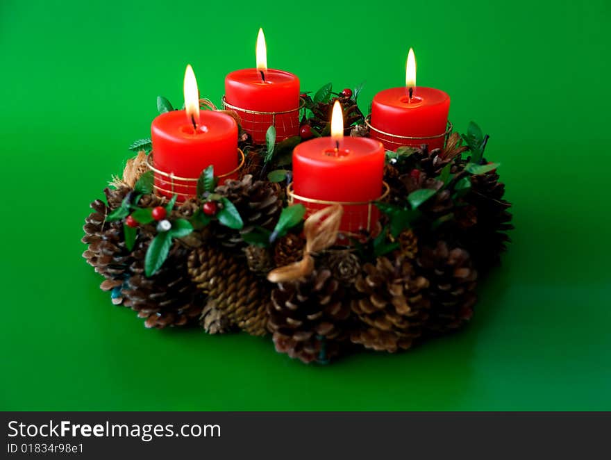 Christmas candles arrangement in colorful festive themes