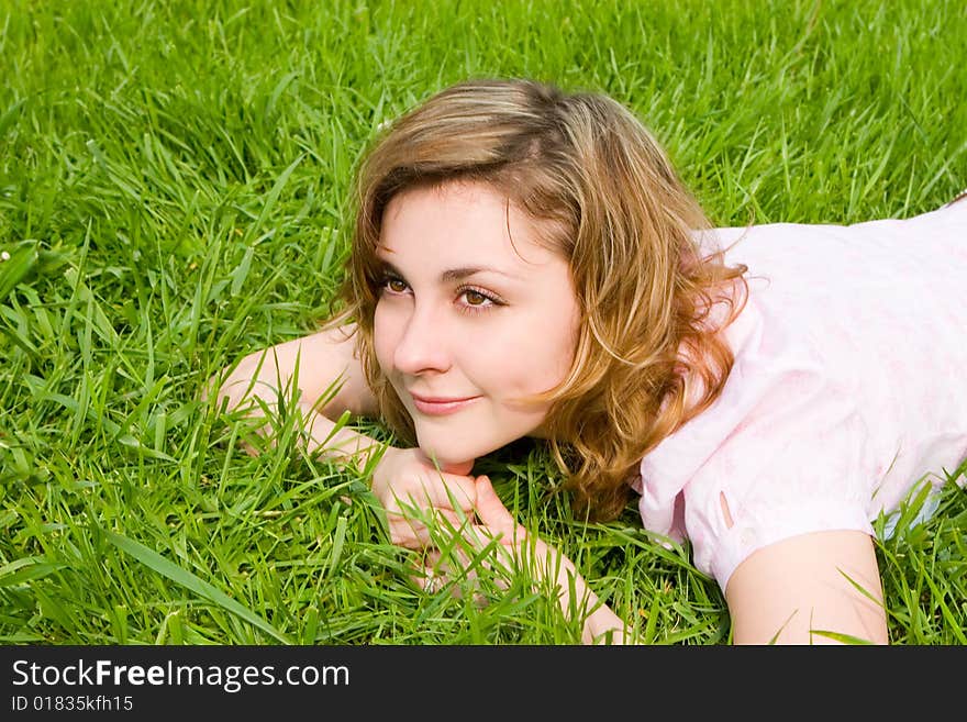 Sweet woman rest on the grass