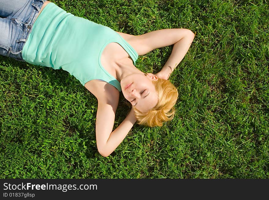 Woman Rest On The Grass