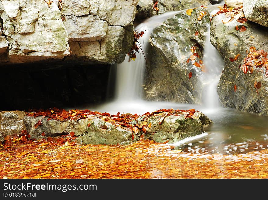 Flowing water into small waterfalls