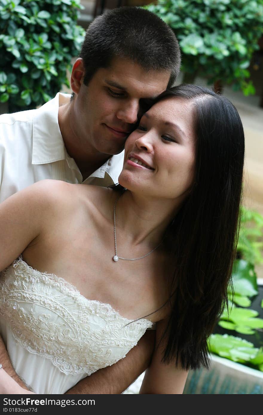 Happy bride and groom on their wedding day. Happy bride and groom on their wedding day.