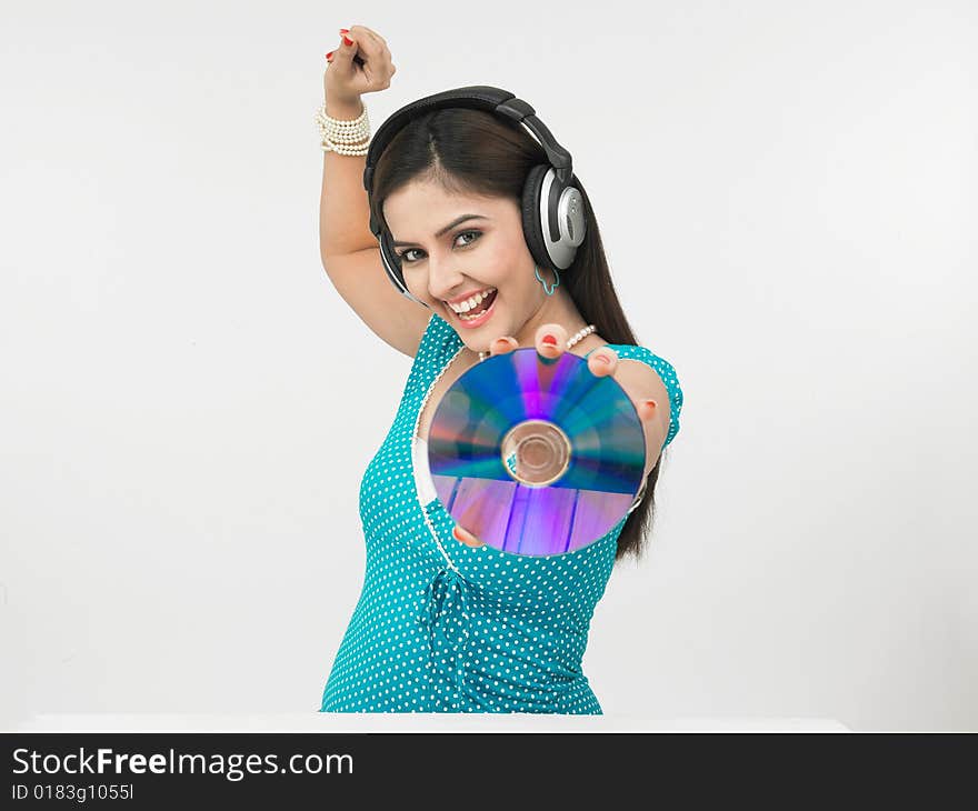 A pretty asian female grooving to the music. A pretty asian female grooving to the music