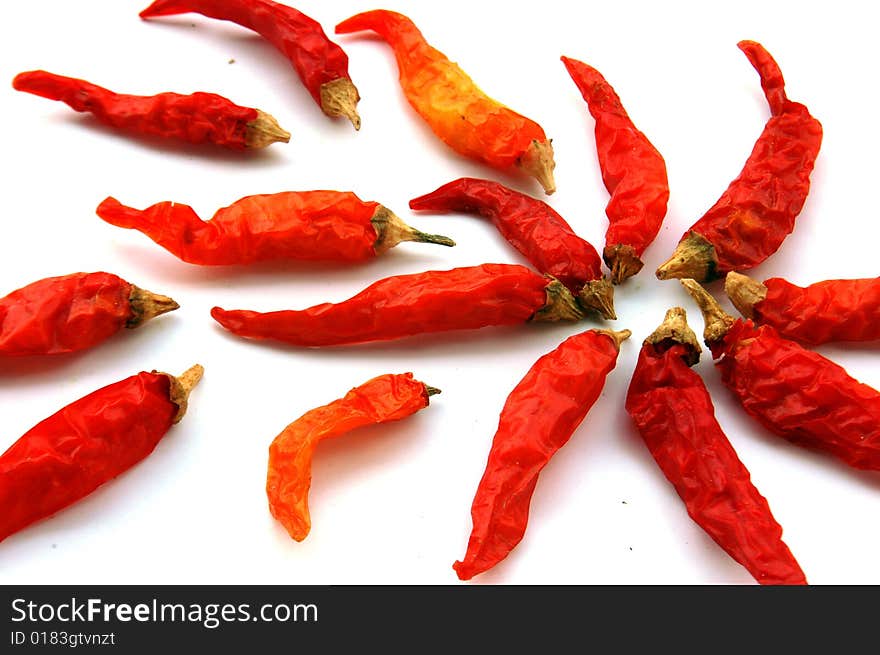 Dry red pepper isolated on white