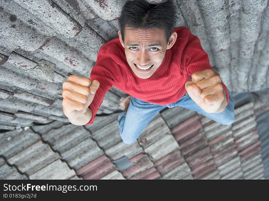 Man with his expression on the roof. Man with his expression on the roof