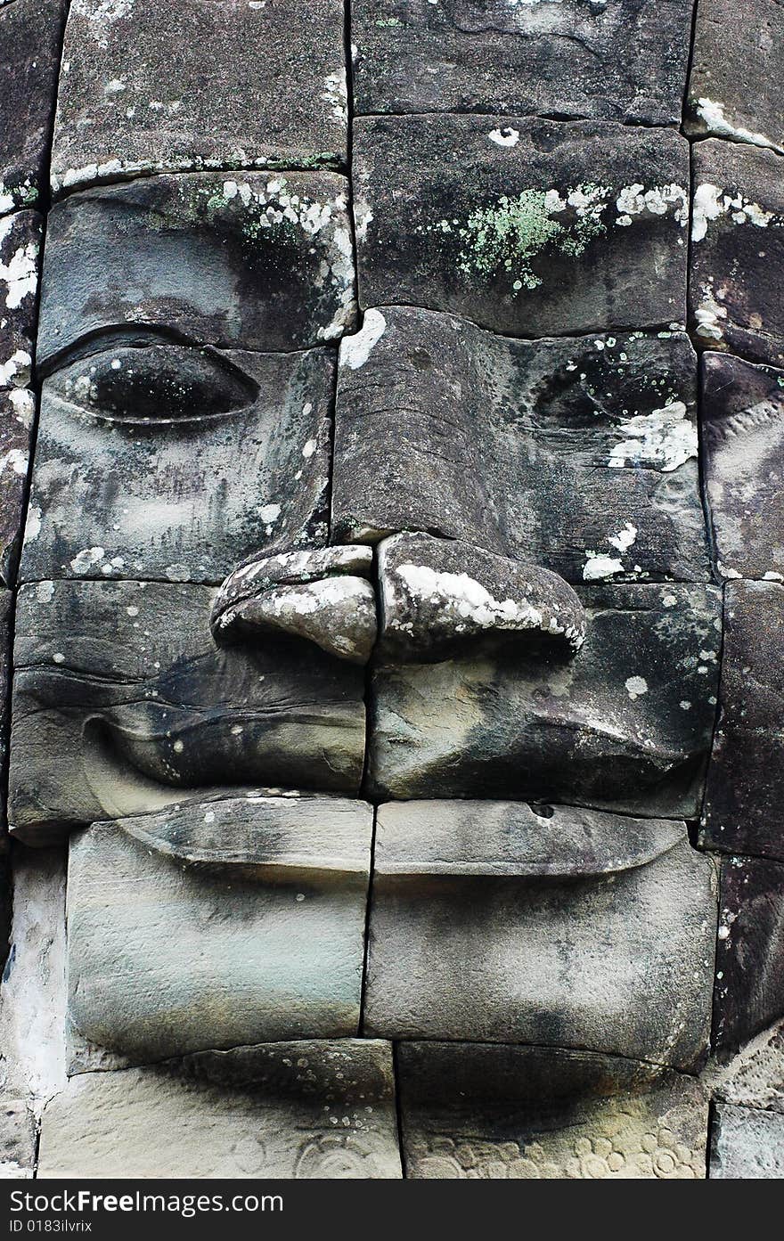 Smiling Buddha sculpture in Angkor,Cambodia