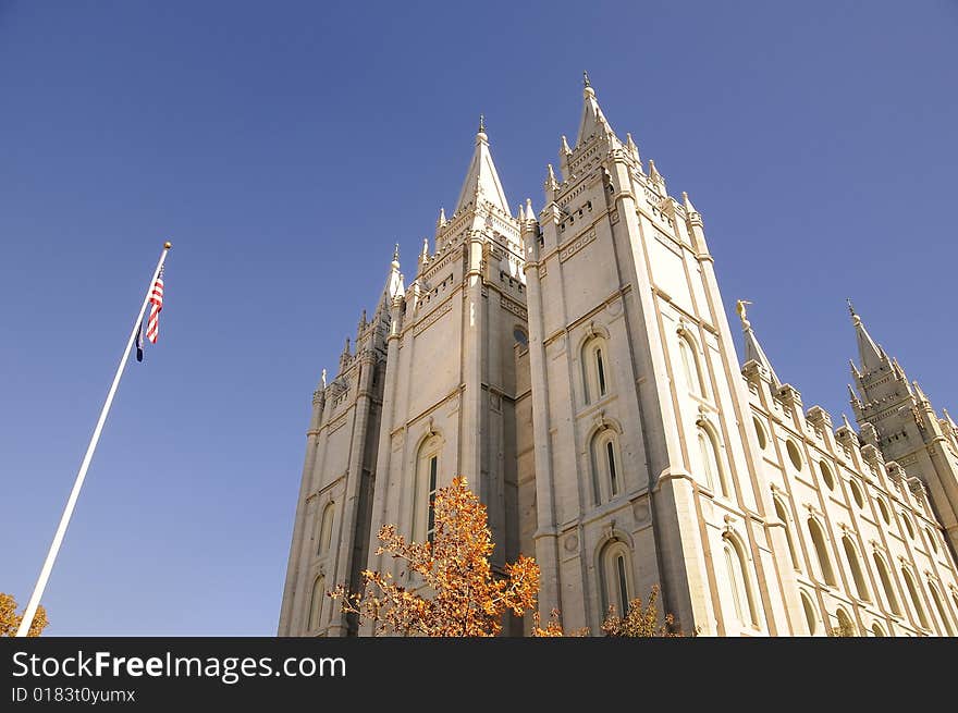 Looking up at a mormon temple in the fall