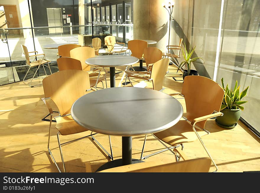 Empty coffee table and chairs with shadows. Empty coffee table and chairs with shadows