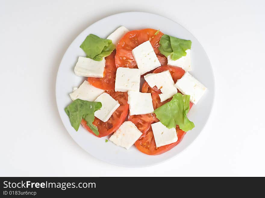 A fresh salad isolated over white background