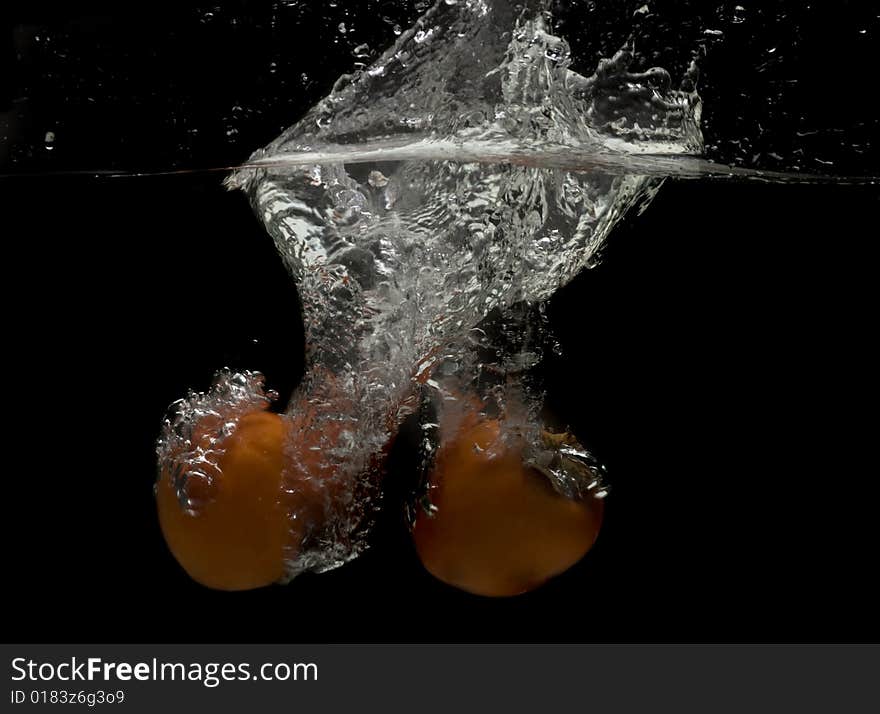 Splashing persimmons.Series of splashing fruits