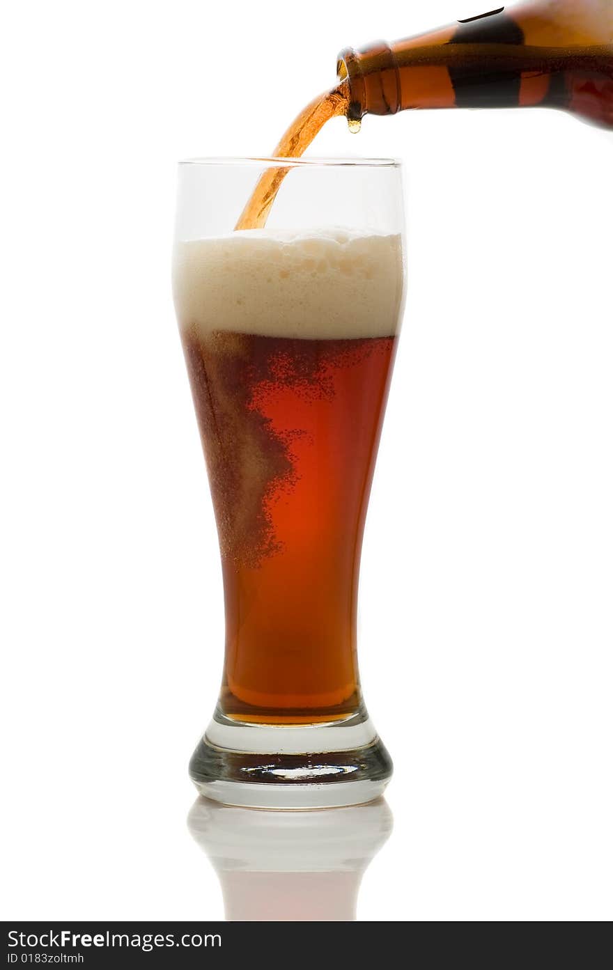 Glass of beer isolated on white