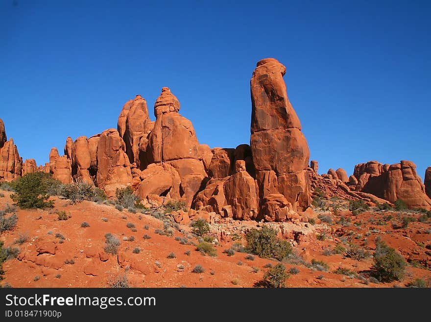 View of the red rock formations in Arches National Park with blue sky�s