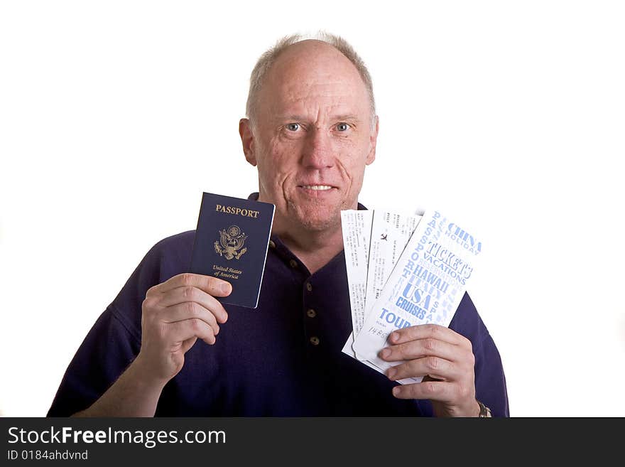 An older guy with a passport and airline tickets. An older guy with a passport and airline tickets