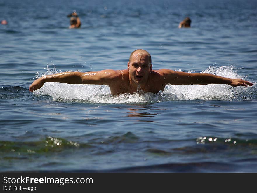 Swimming in classical style. Black sea.