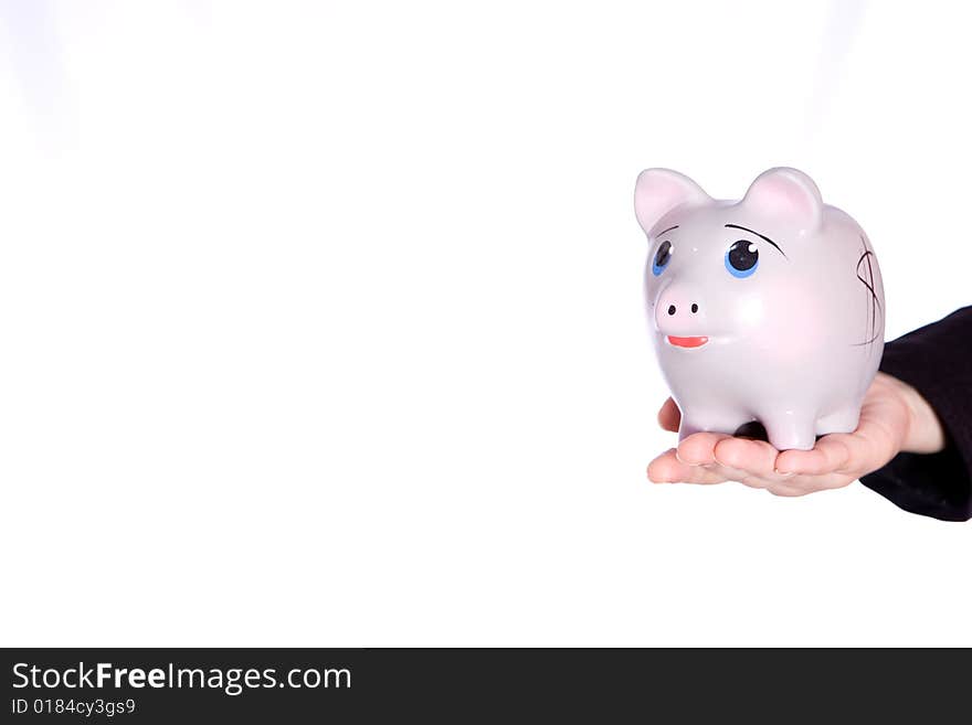 Holding piggy bank on the white background