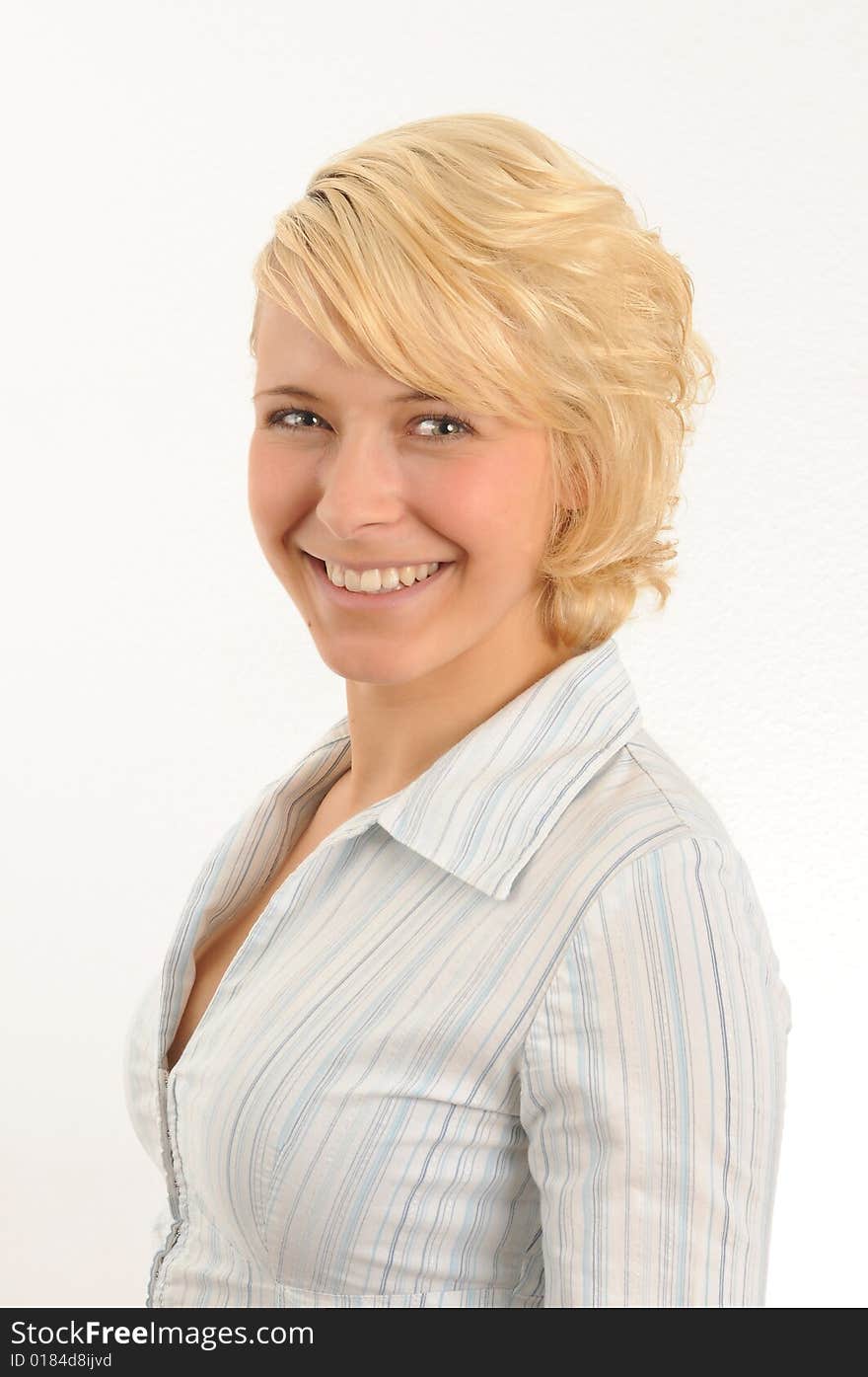 Portrait of a young woman.Wearing a blouse.Isolated over white.