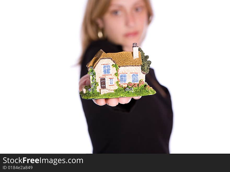 Holding small house on the white background. Holding small house on the white background