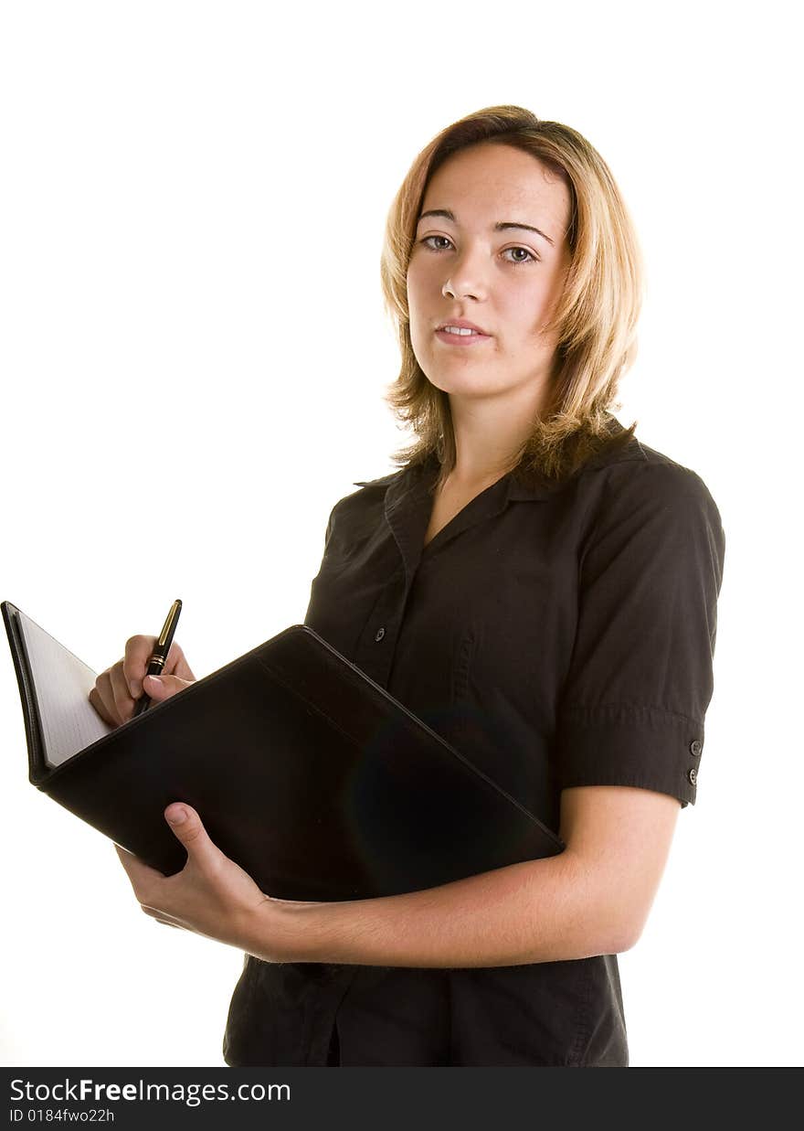 Blonde In Black Shirt Writing In Notebook