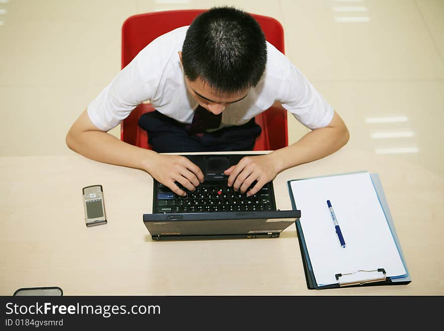 Young  businessman in his office