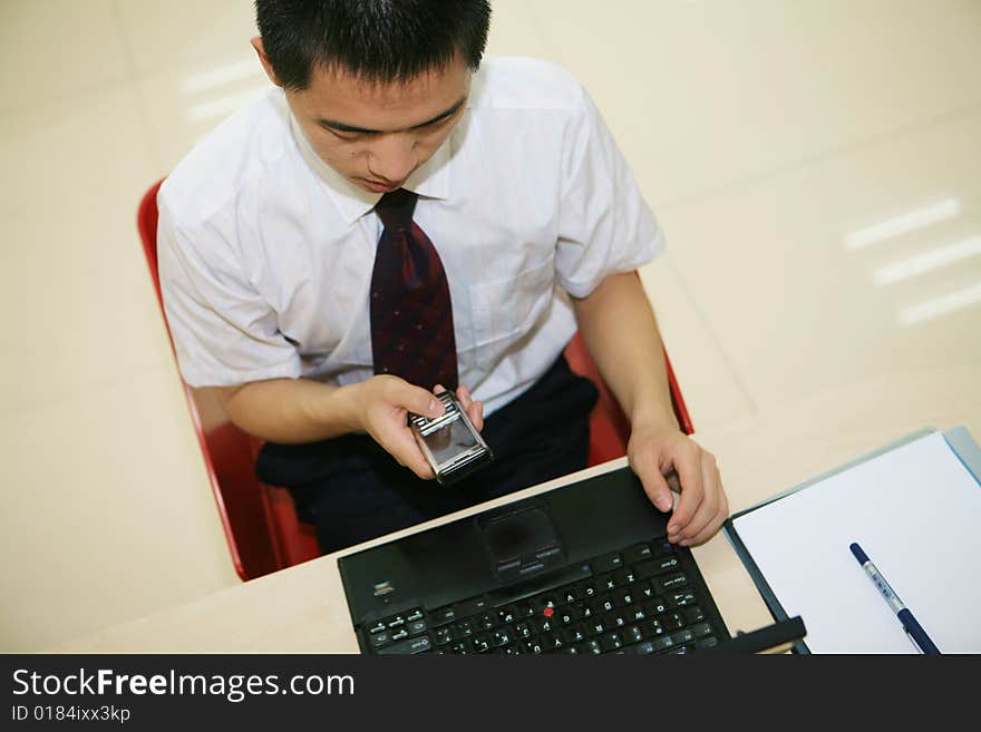 Young  Businessman In His Office