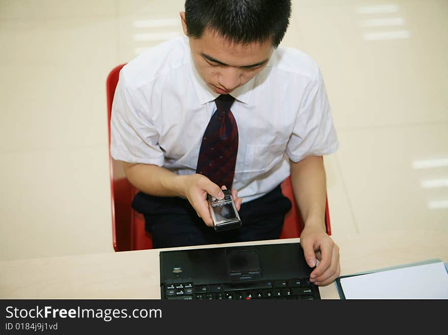 Young  Businessman In His Office