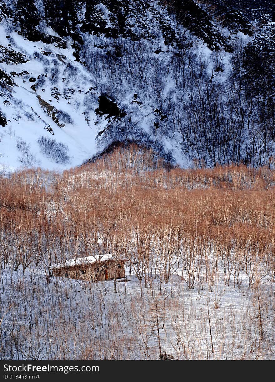 Snowy mountain hut