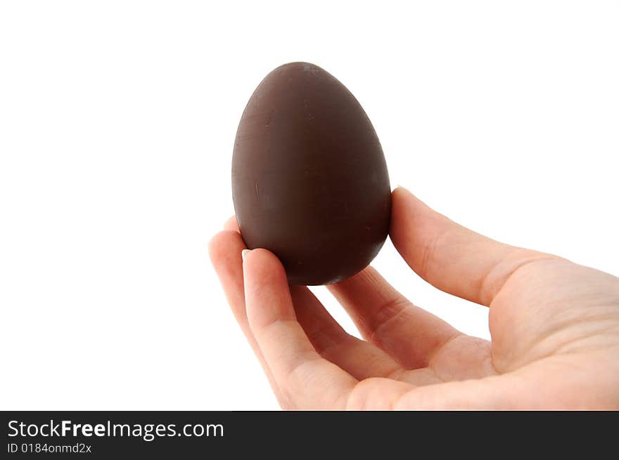 An Isolated to White photo of a mini Easter Egg with toy inside. An Isolated to White photo of a mini Easter Egg with toy inside