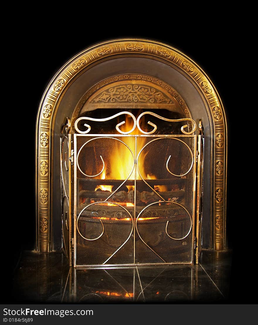 Antique fireplace over black background