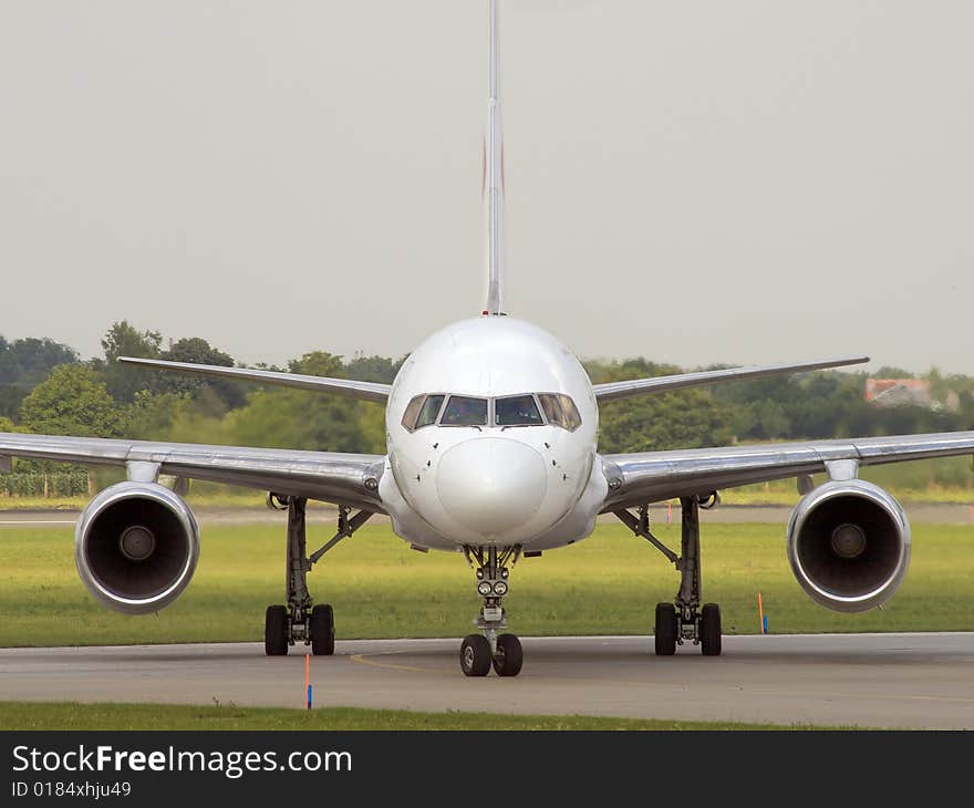 Airplane is turning left to apron after landing. Airplane is turning left to apron after landing