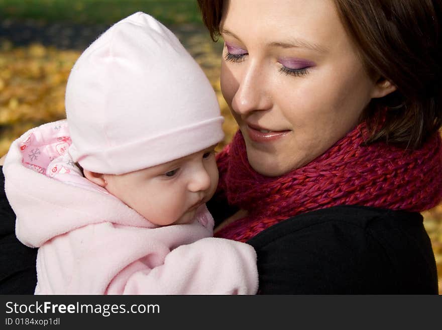 Happy mother with baby outdoor. Happy mother with baby outdoor