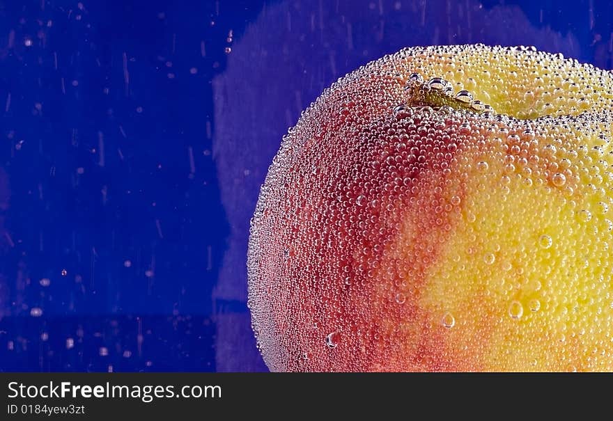 Abstract background with apple and bubbles on the water