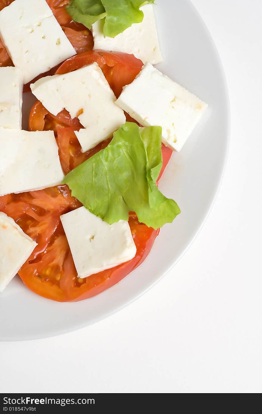 A fresh salad isolated over white background