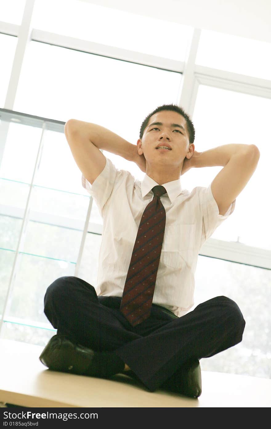 Young businessman sit in office