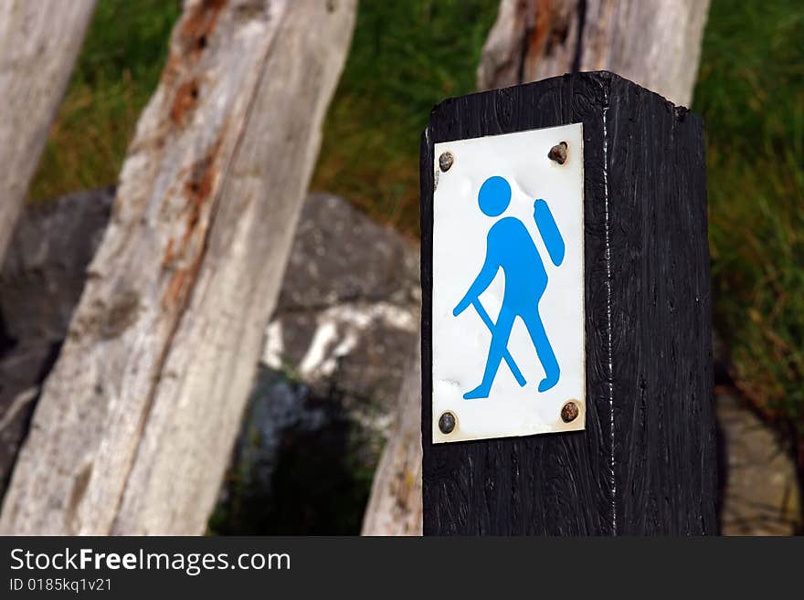 A direction sign for a designated tourist walk. A direction sign for a designated tourist walk