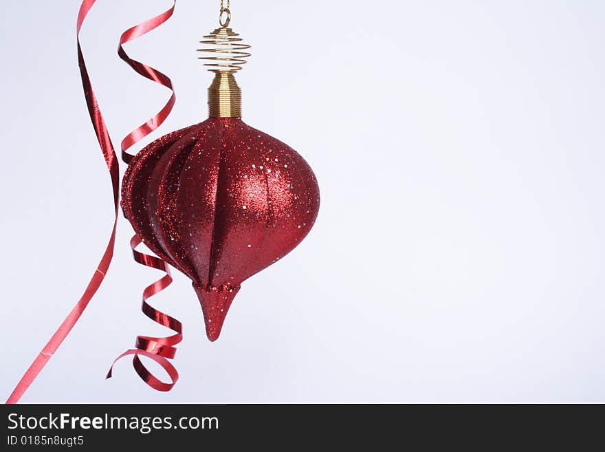 Hanging decorative Christmas ball in white background. Hanging decorative Christmas ball in white background