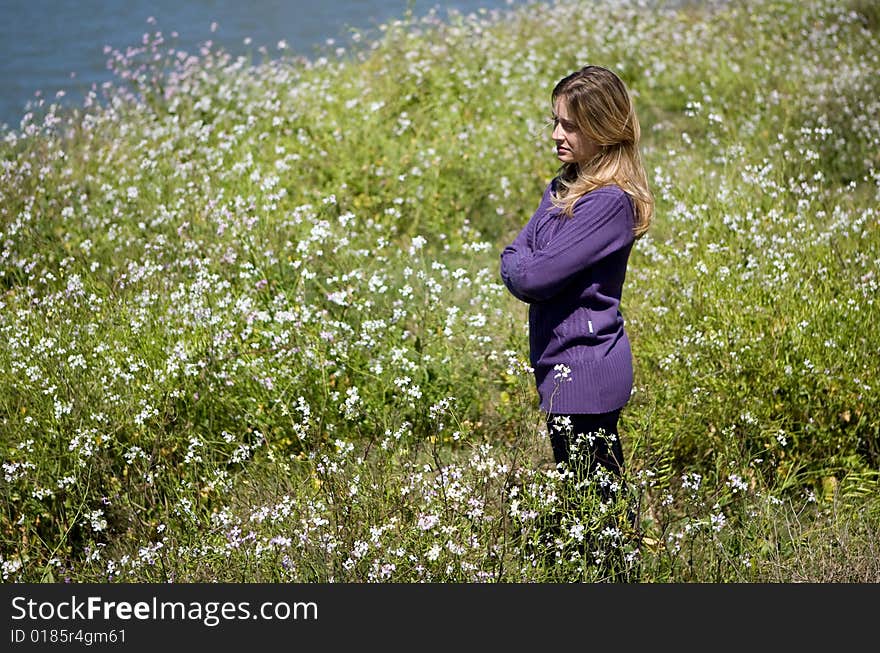 Beautiful woman on the fields flowers. Beautiful woman on the fields flowers